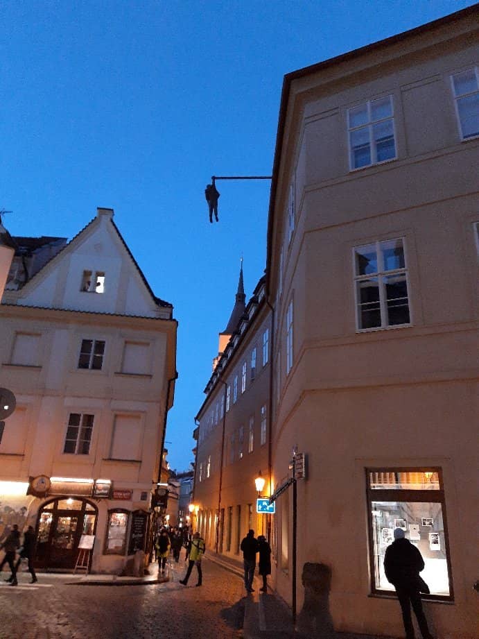 Man Hanging Out Sculpture