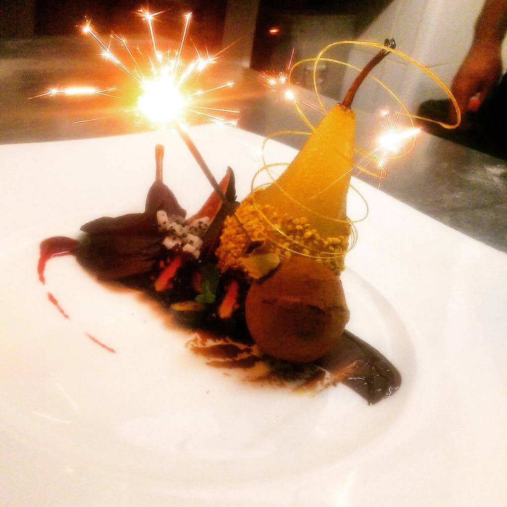 Poached pear, Bee pollen and chocolate 'bomb'