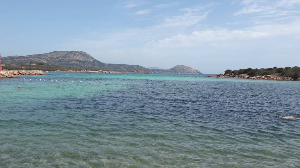 Golden Sands and Rocky Backdrops