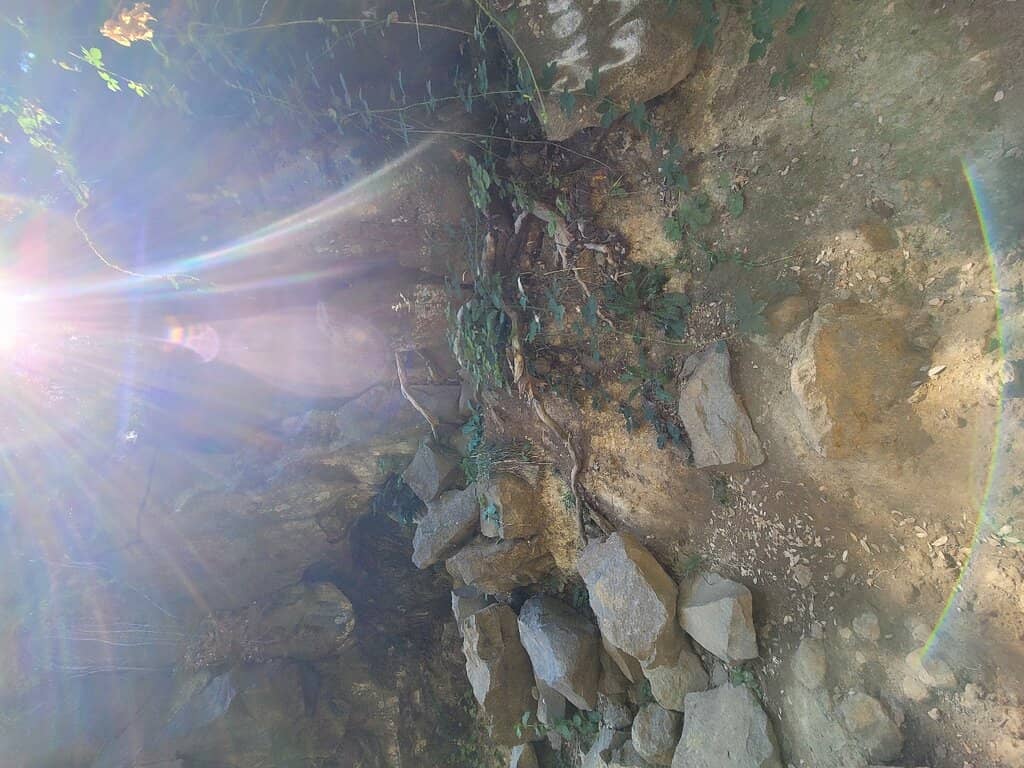 Secret Cave Beside Falls