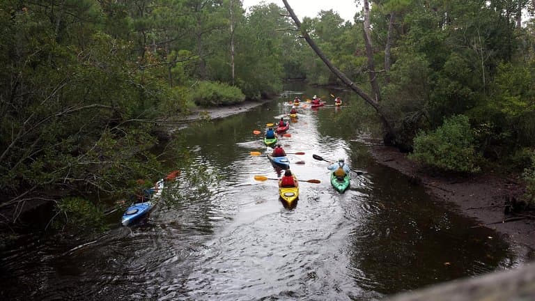 Kayaking group as seen from the covered bridge