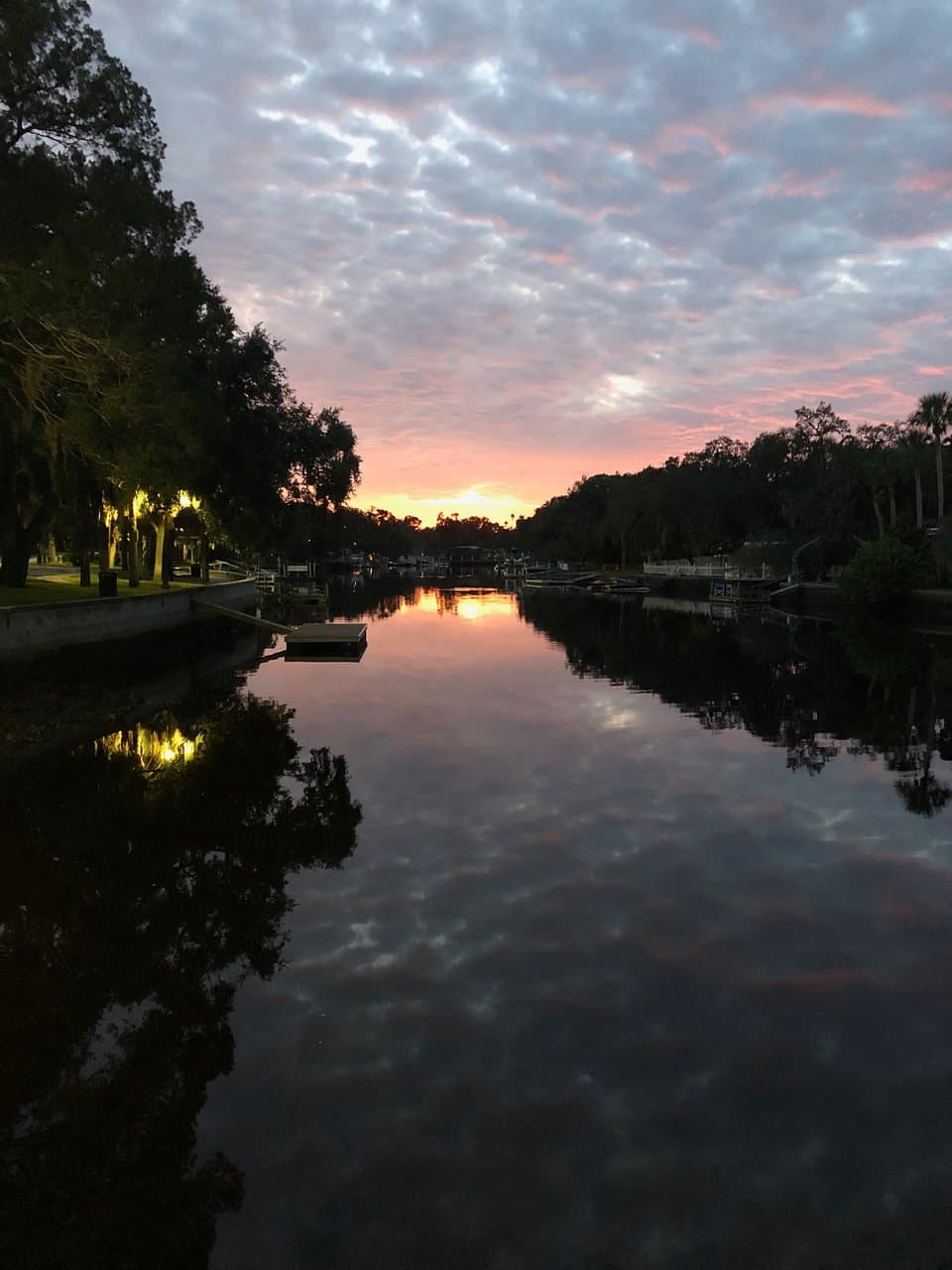 SUNSET ALONG THE RIVER.