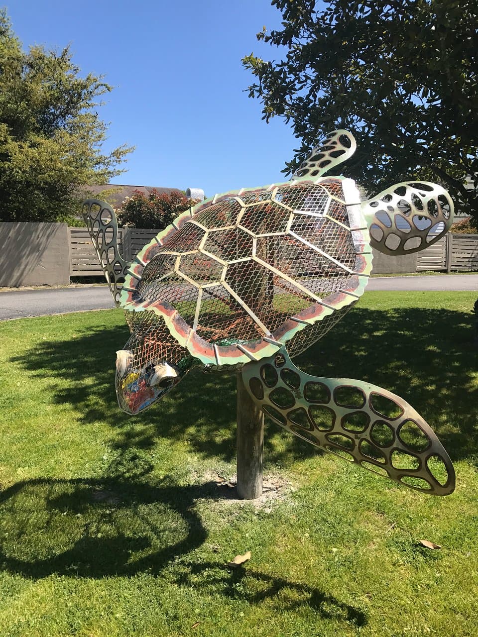 A Sea Turtle Sculpture made of metal from artist Jim Swain is on display on the Museum grounds.
