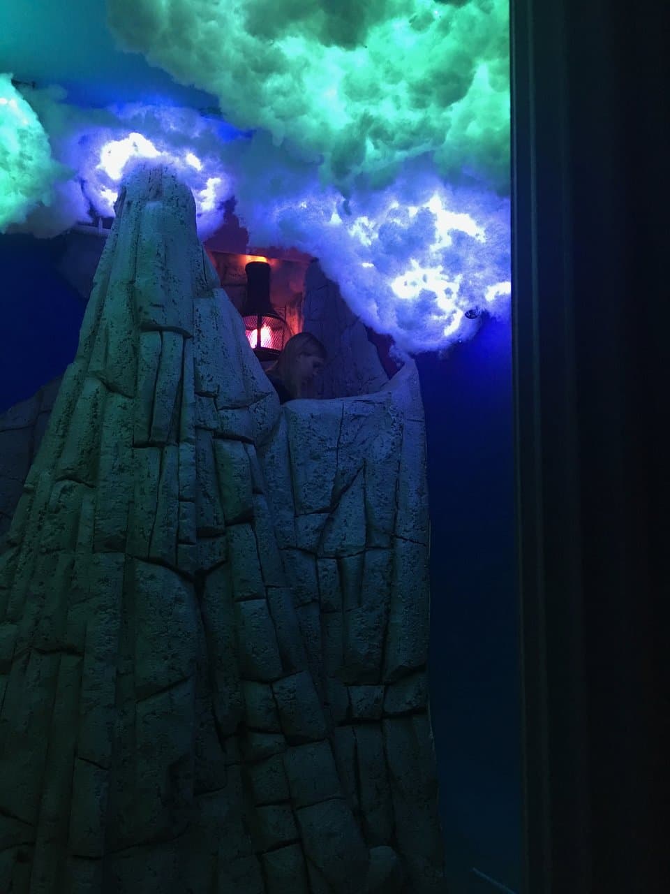 This is the first room you come into to. This actually has stairs going up to the top. This escape room has a lot going on.