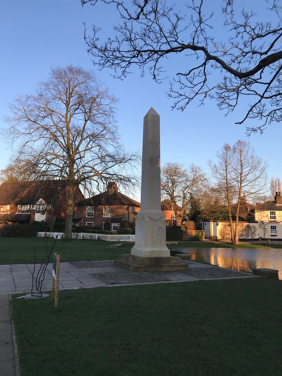 Views of the Green, the pond and the War Memorial