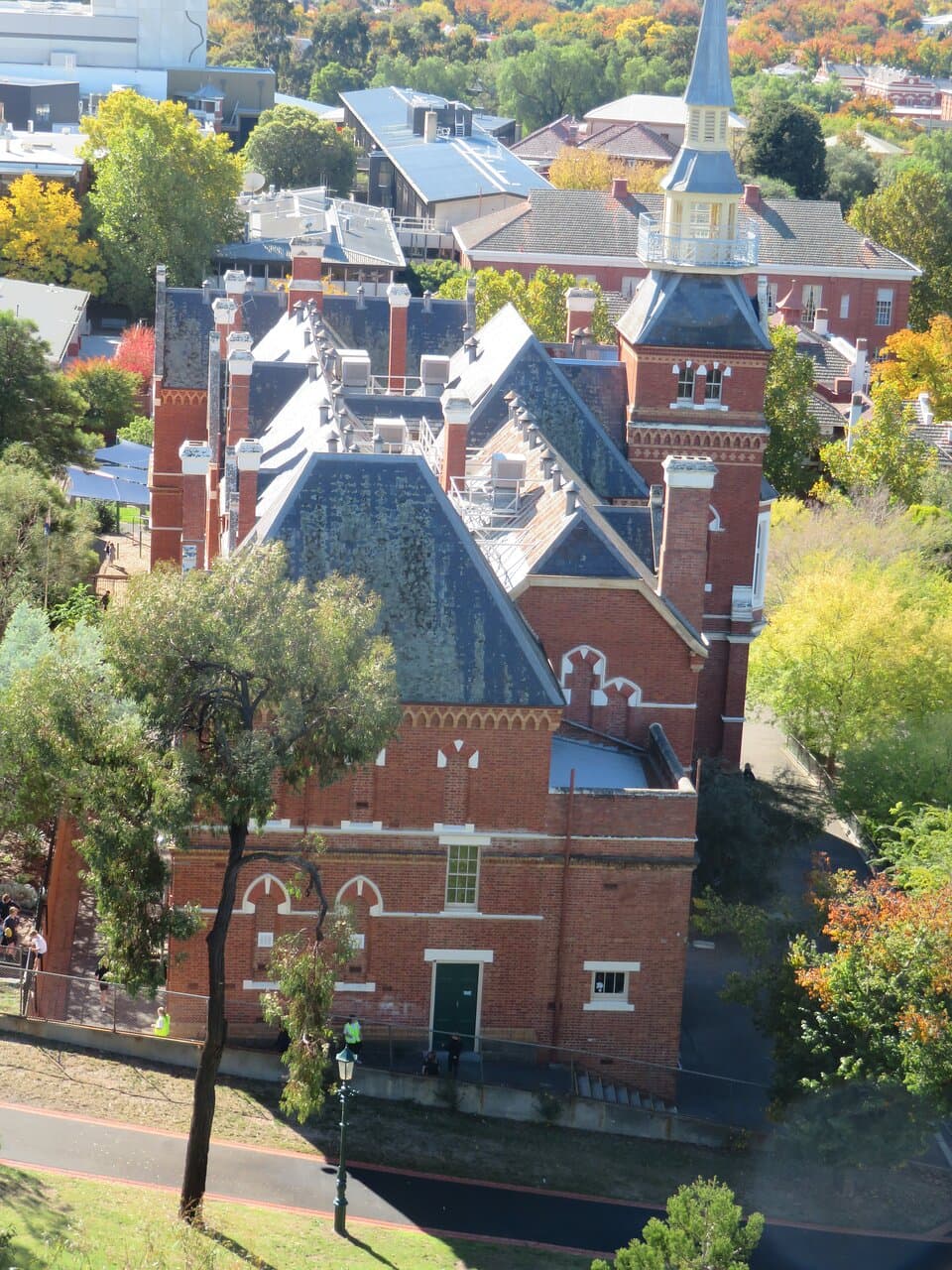 The poppet head overlooks Camp Hill School which was built to an English Gothic design on ex-Police land in 1877. It opened in 1887 with 1,290 students. The tower was originally used  as a fire look-out for the city