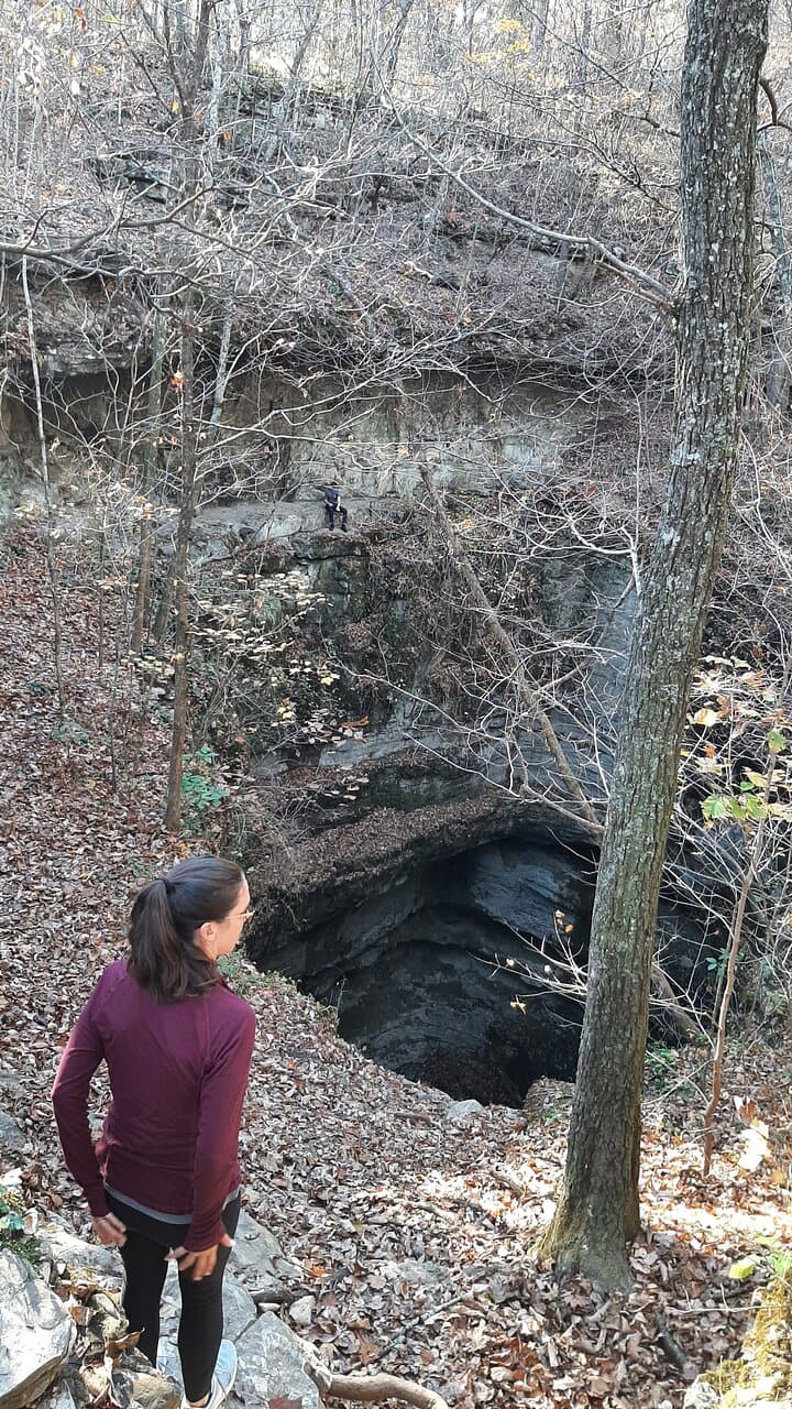 For perspective of hole size, consider the person on the ledge over the hole on the far side.