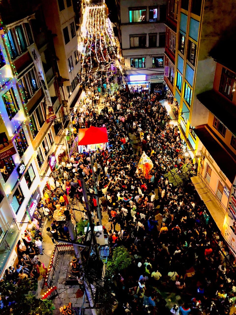 Captured during Indra Jatra 2080 aka YenyaPunhi 1143 Nepal Sambat. PuluKisi aka white elephant aka Yerawat on the loose among the crowd.
