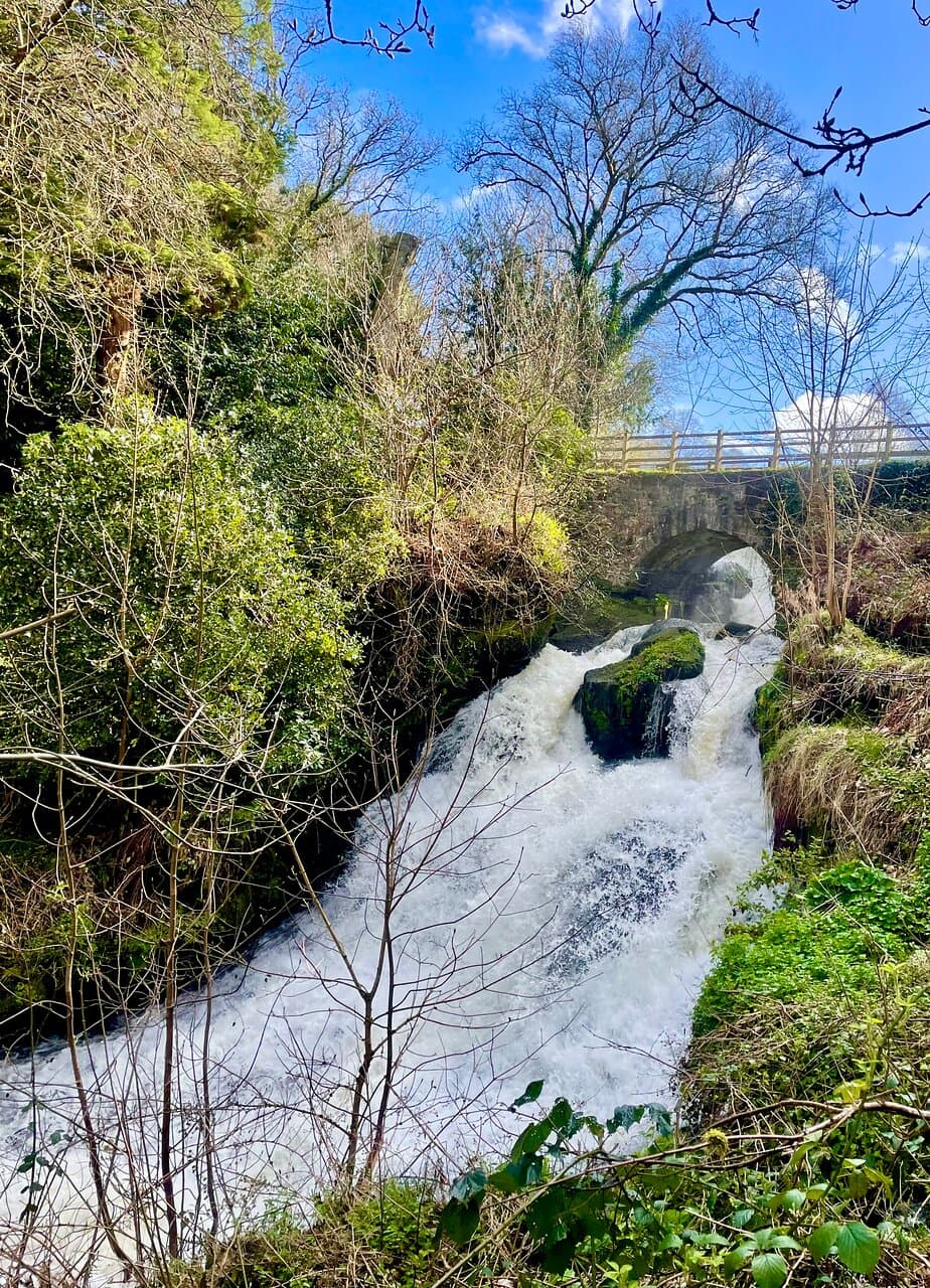 The beautiful tumbling waterfall once powered a mill, and latterly supplied water to a print house in the early 19th century. 