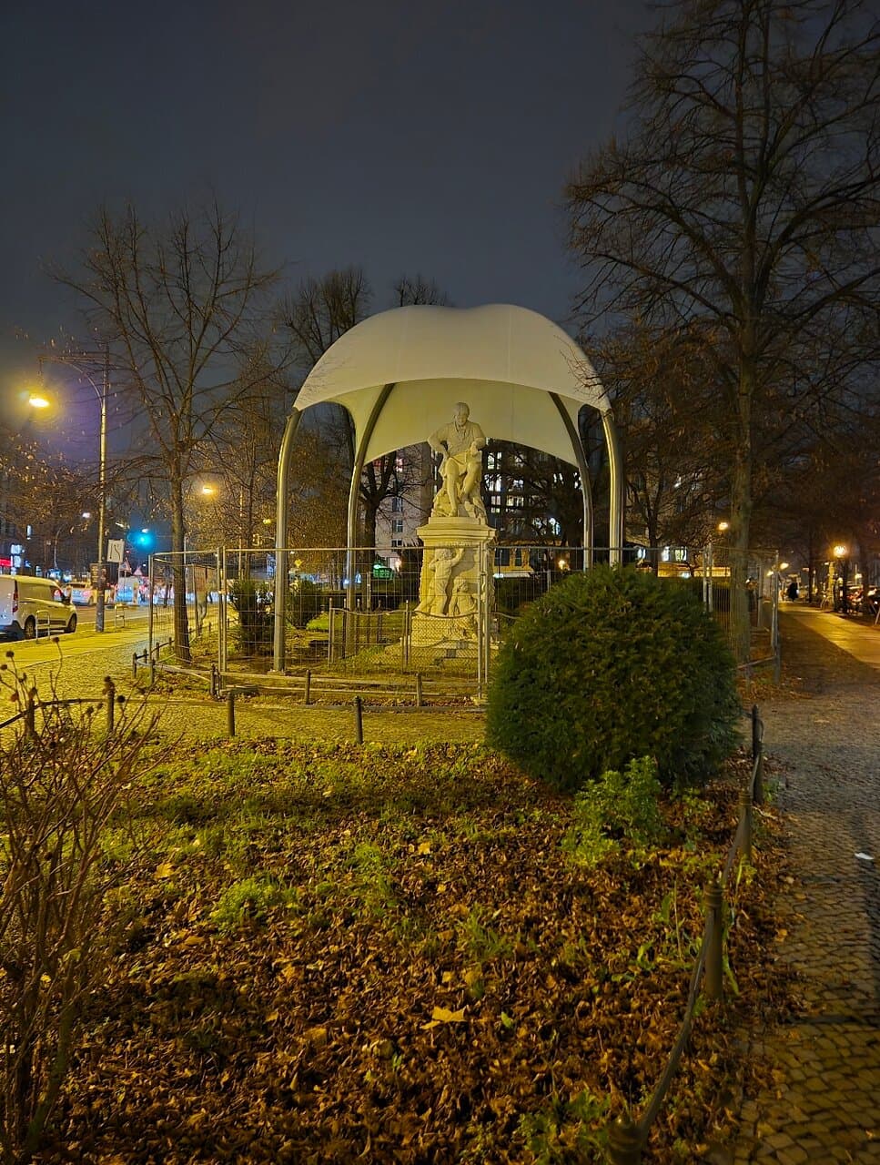 Statue Of Johann Alois Senefelder on Senefelderplatz
