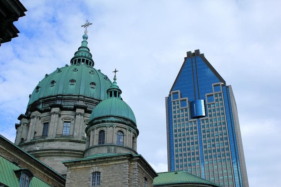                   Cathedral of Marie-Reine-du-Monde and "The Pencil"
                