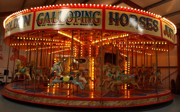 golden galloping horses carousel