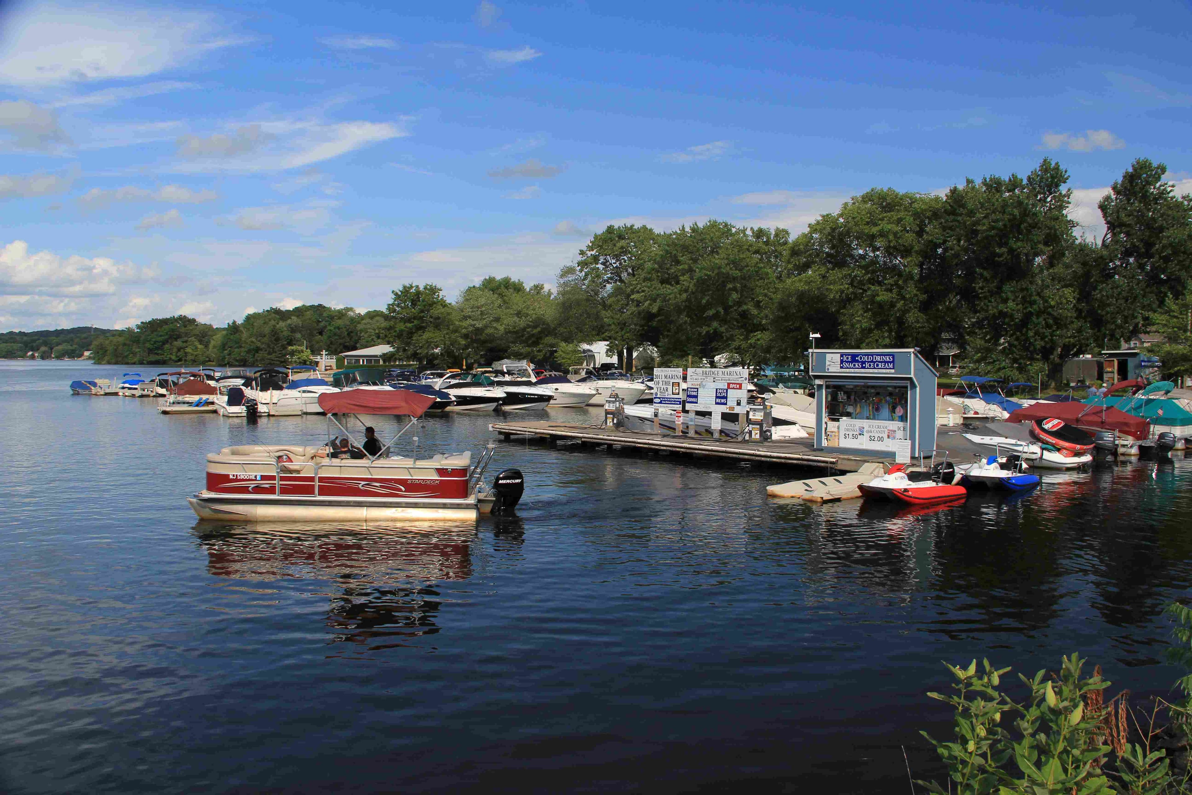 Bridge Marina Pontoon Boat Rental leaves the dock for a day of fun on Lake Hopatcong