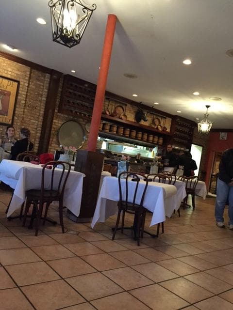 From the seating area, with the kitchen in the background.