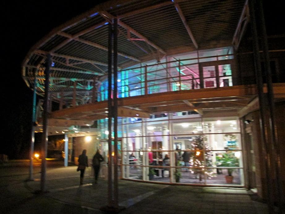 Tacchi Morris Arts centre foyer by night - with Christmas decorations!