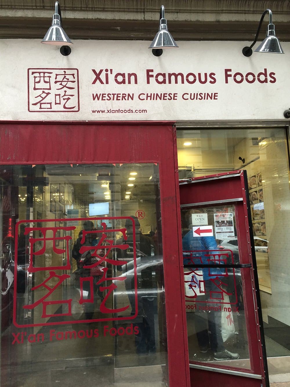 small storefront on a busy street