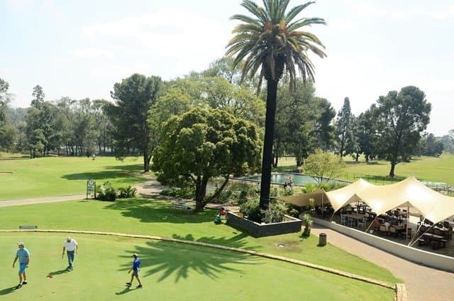 Putting green & Palm Terrace to the fishing dam.