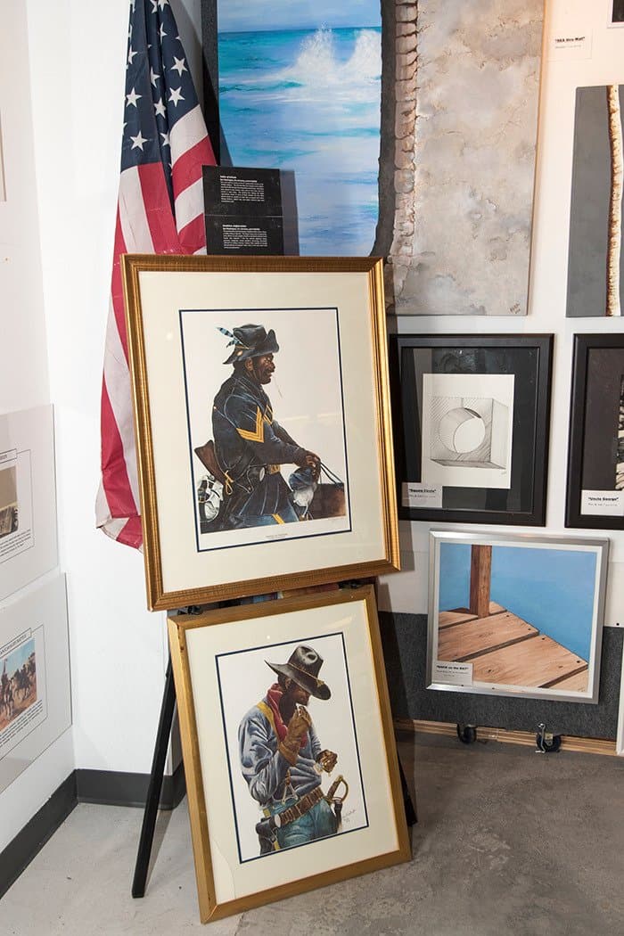 Artwork featuring a Buffalo soldier and a Black Cowboy.