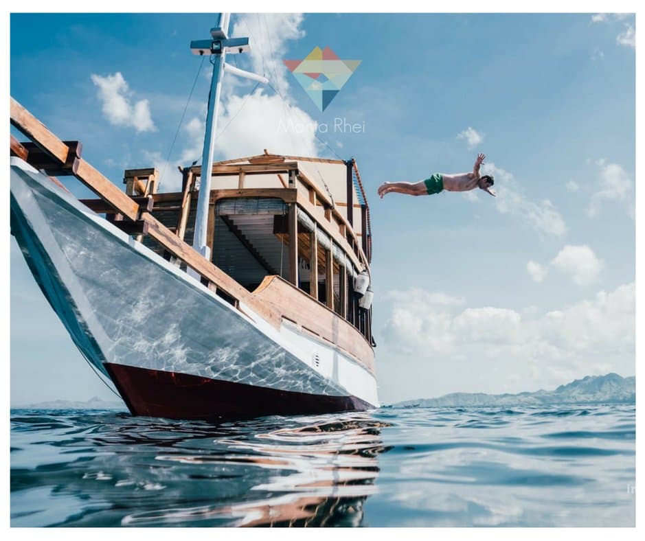 Jumping from the top deck of the Treebucca, our day trip boat. Photo courtesy of Inspired by Twe