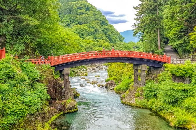 The Shinkyo bridge is at the entrance to the UNESCO heritage listed temples and shrines of Nikko.  During summer when everything is so green and the river is flowing it's especially striking.