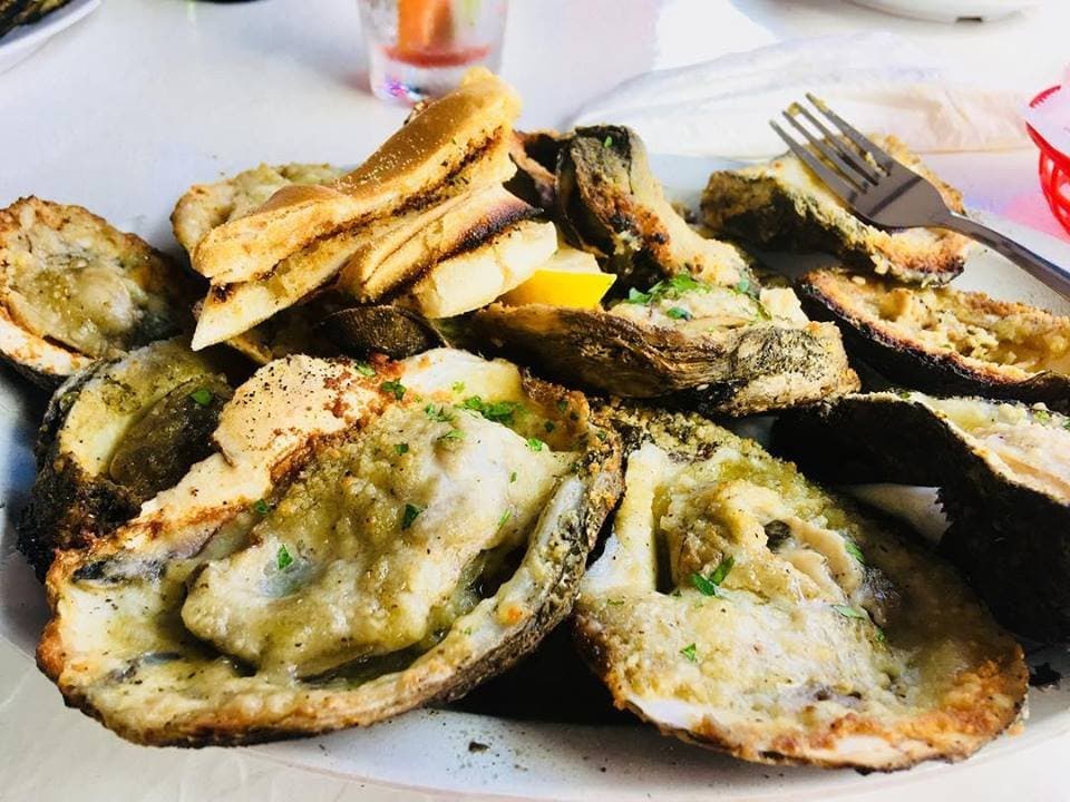 Grilled Oysters our take on the New Orleans tradition