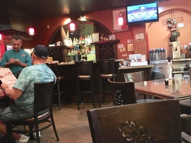 One of a few TVs, and the bar
