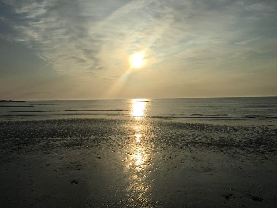 Seapoint Beach past sunrise. No one else on beach - nice reflection at sunrise!