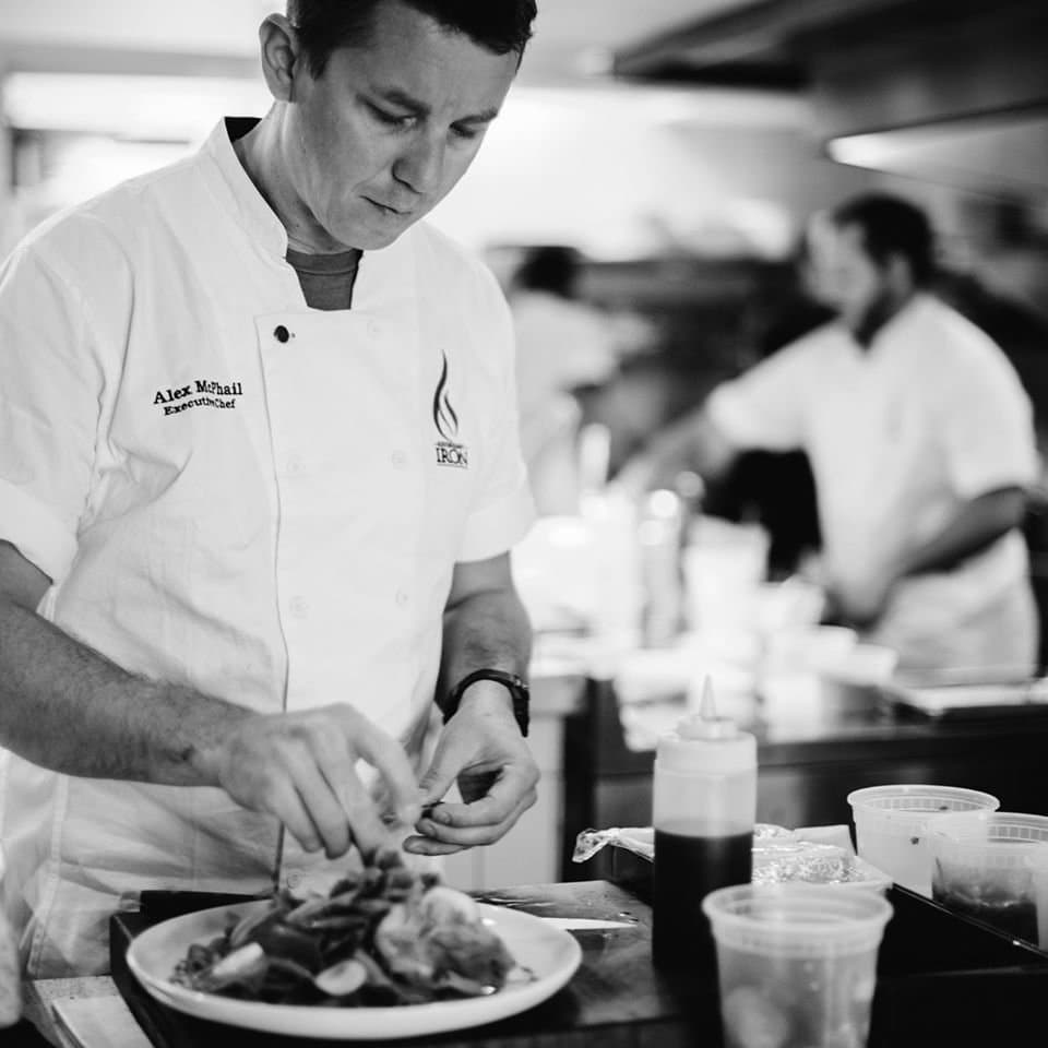 Chef Alex McPhail finalizing the last details