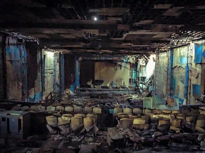 Before the restoration the theater looked like this. Venue was shuttered between 1988-2019. Collapsed roof allowed nature to take its toll on the once majestic theater. 