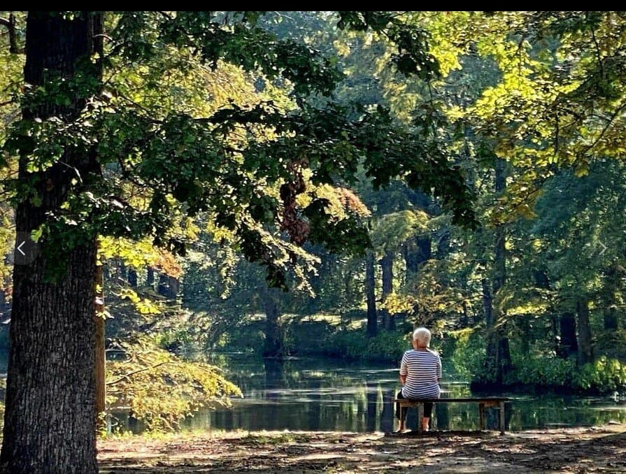 My sister at the banks of the bayou by the cabins.