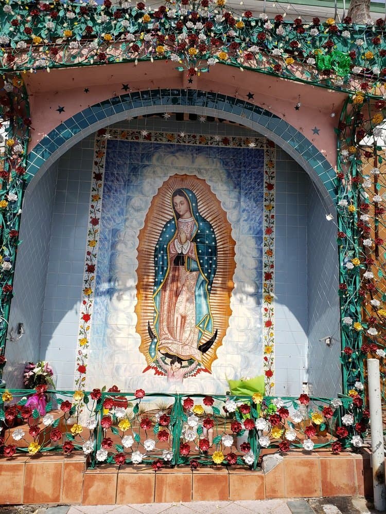 Our Lady at the entrance.