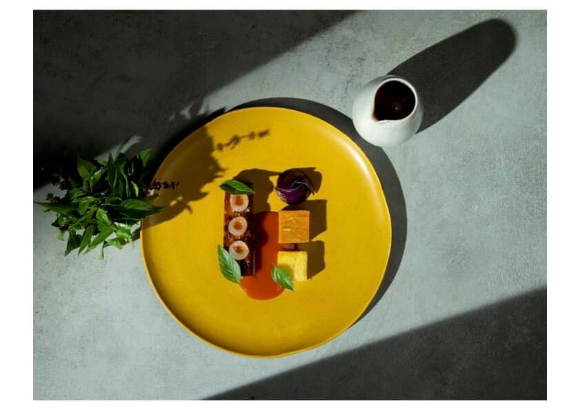 smoked red rice tempeh, pineapple sweet and sour sauce, miso shallots cream, stir fried onion, local basil .