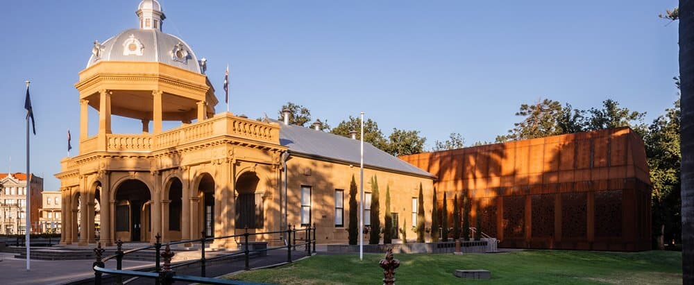 Exterior view of the Bendigo Military Museum - showing the original heritage listed Soldiers Memorial Institute and the contemporary new wing which houses the temporary exhibition space.