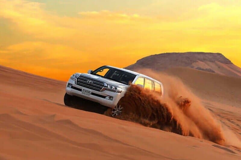 Go Dune Bashing and Sandboarding