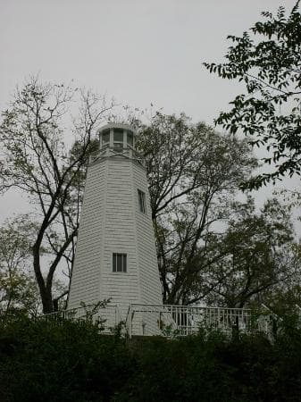 lighthouse at top of hill