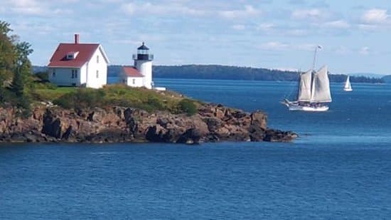Curtis Island Light and schooner