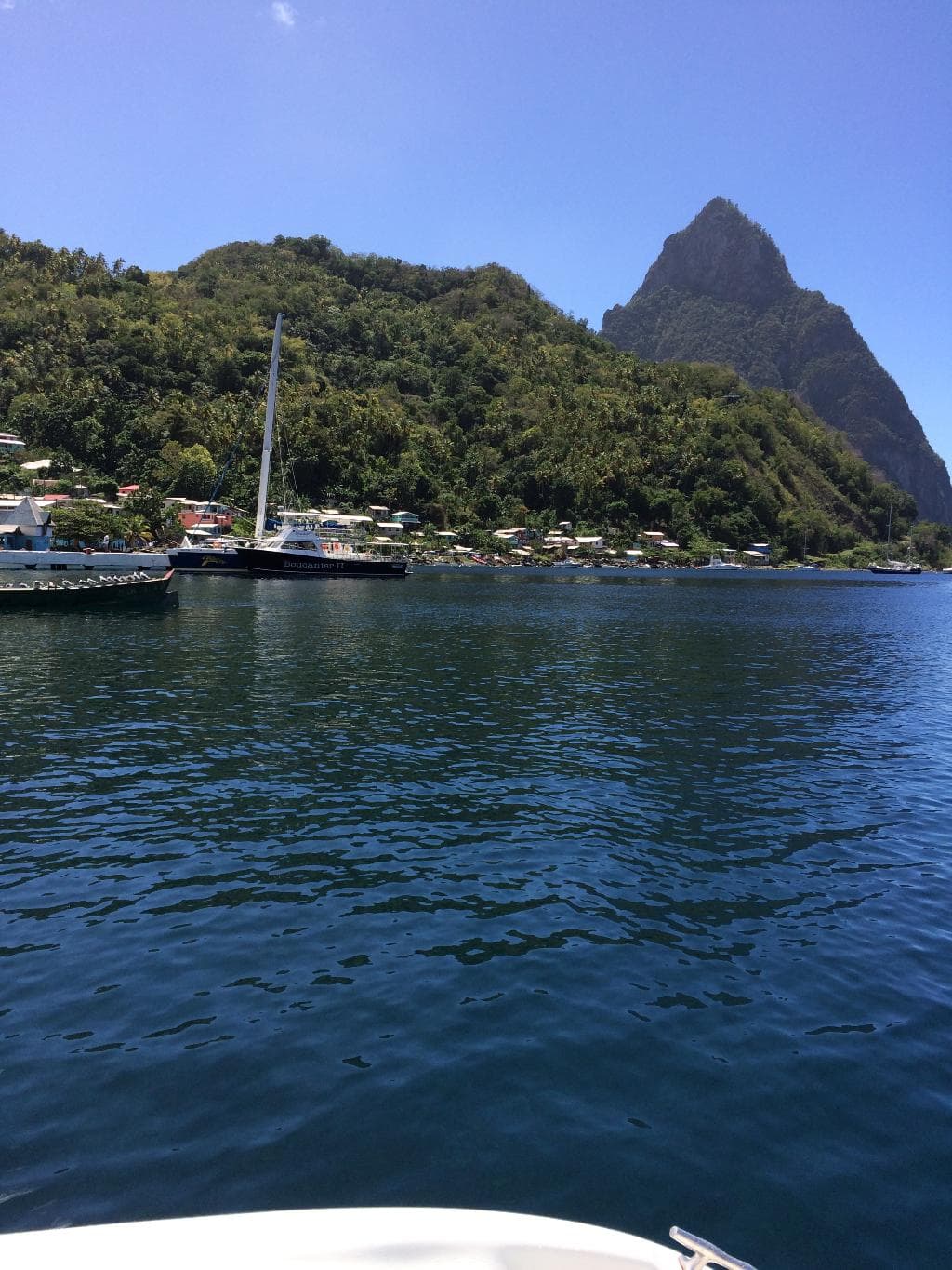 one of the Pitons from Soufriere on the water.