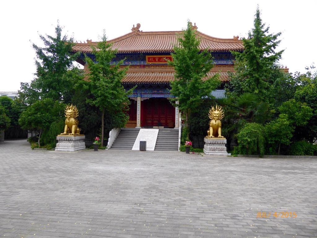Entry into the temple, main temple, stairs to temple, statue guarding temple