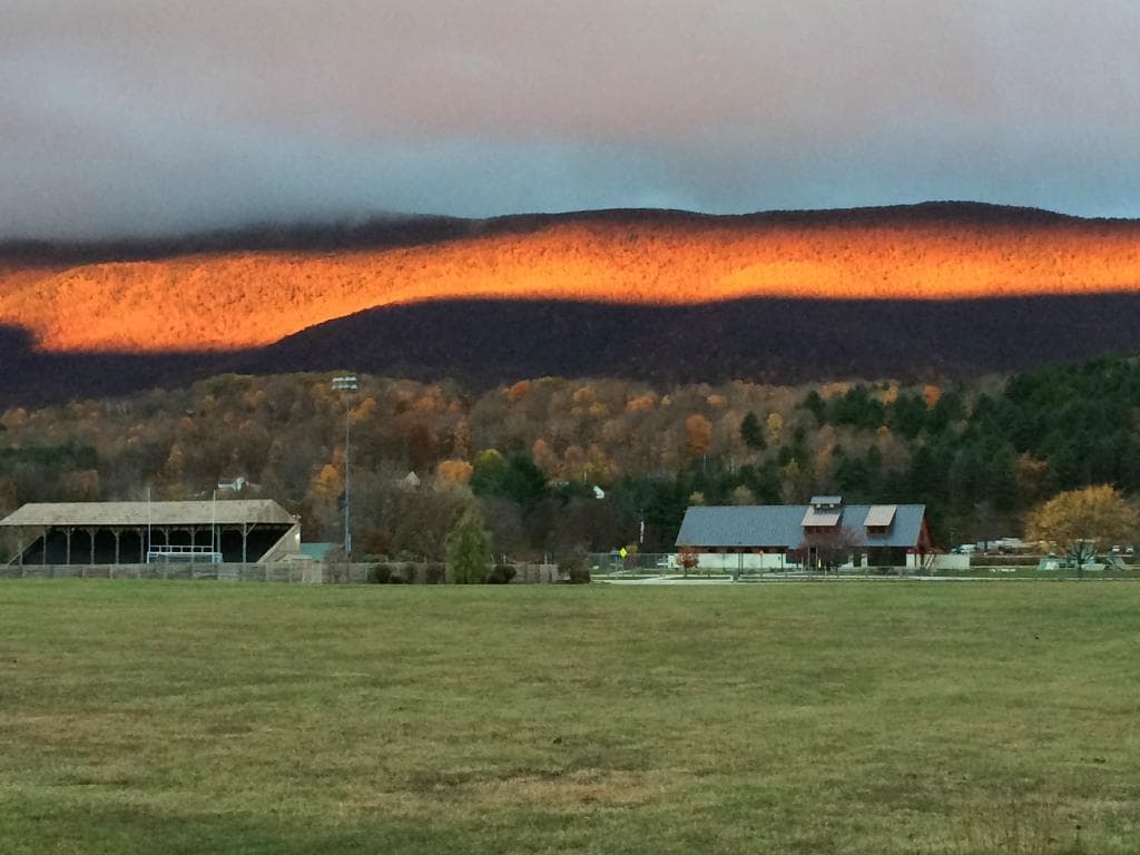 Sunrise lighting up Mount Equinox, from Dana Thompson Park