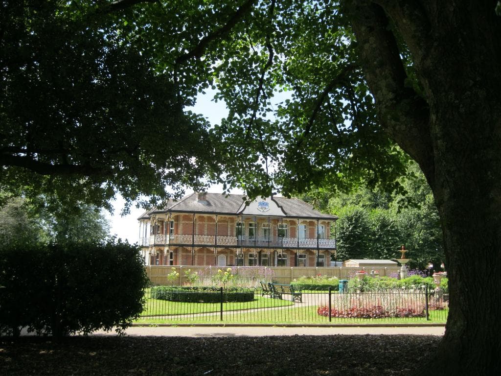 Restored historic building on the edge of the park