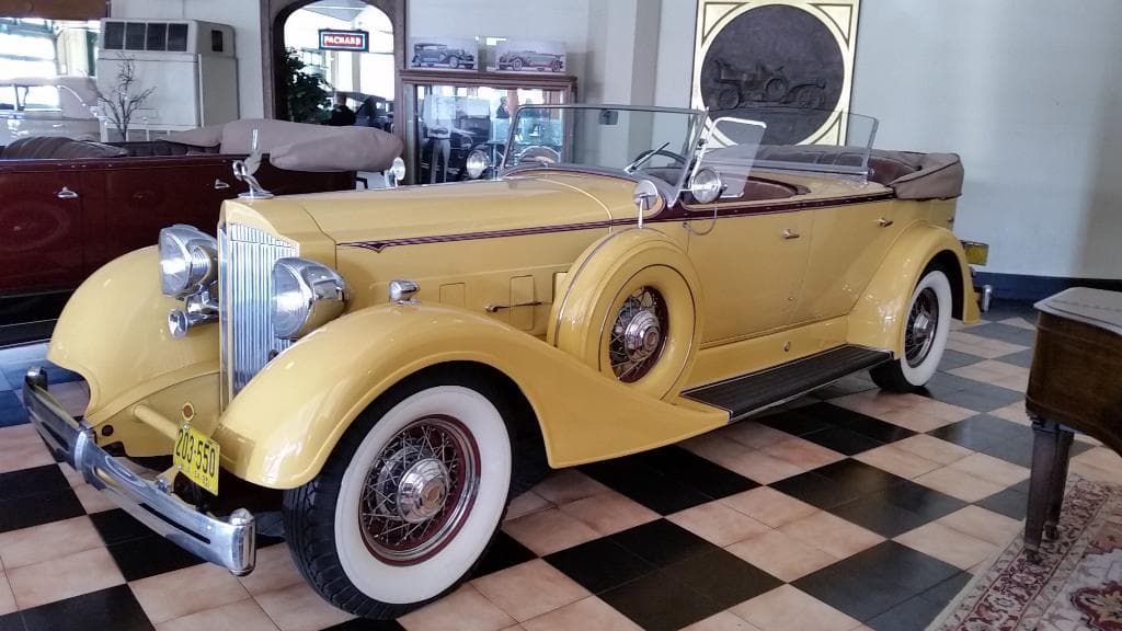 A yellow Packard.