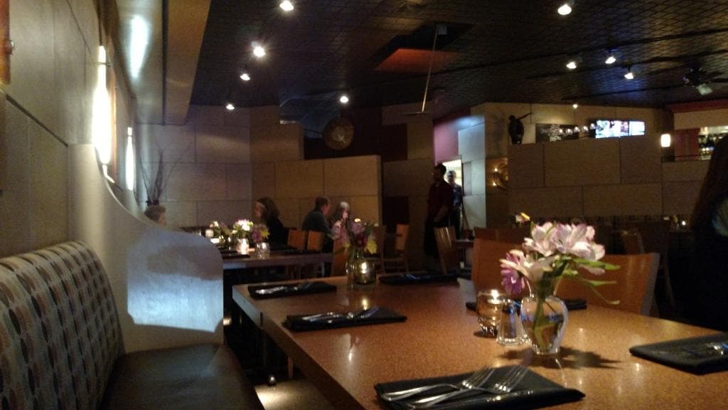 A view of the dining room and bar area from one of the tables at the front of the restaurant.