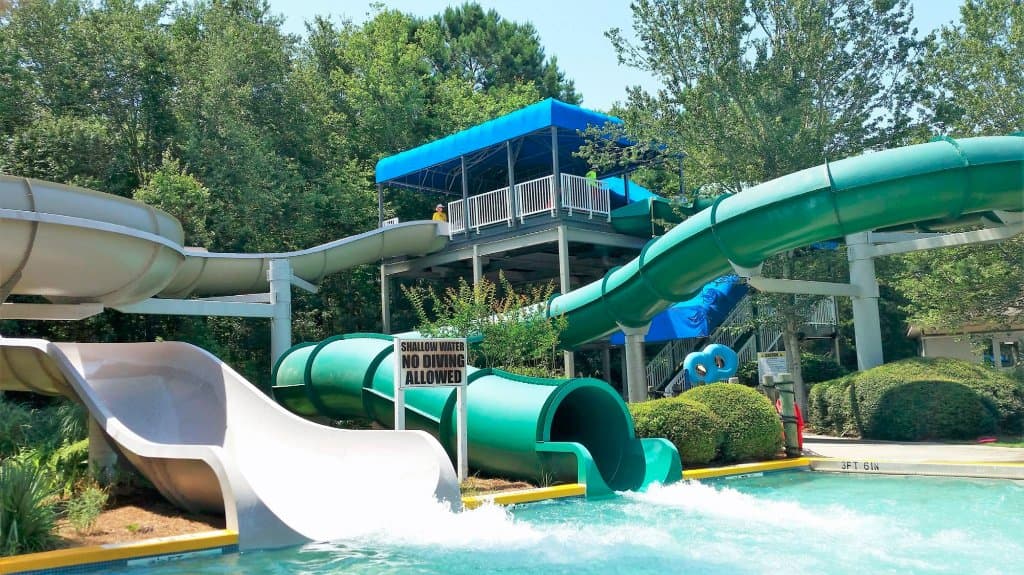 One open and one closed tube slide. Fun for the bigger kids or ride double with a smaller kiddo.