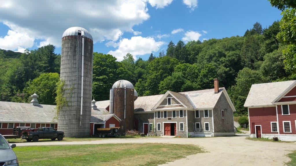 Silos and interesting structures sided and roofed with slate shingles.