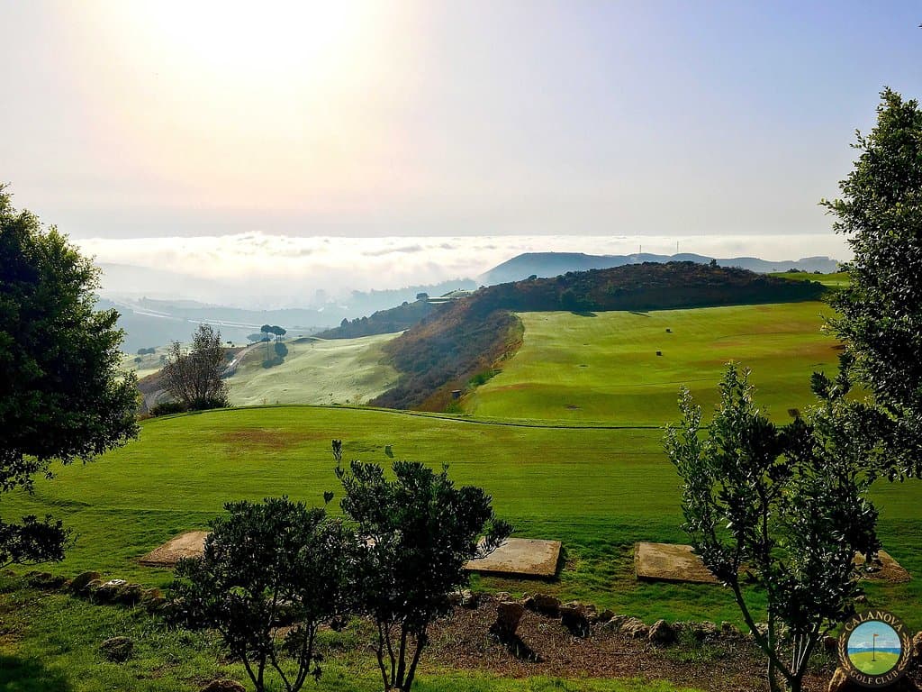 Calanova over clouds