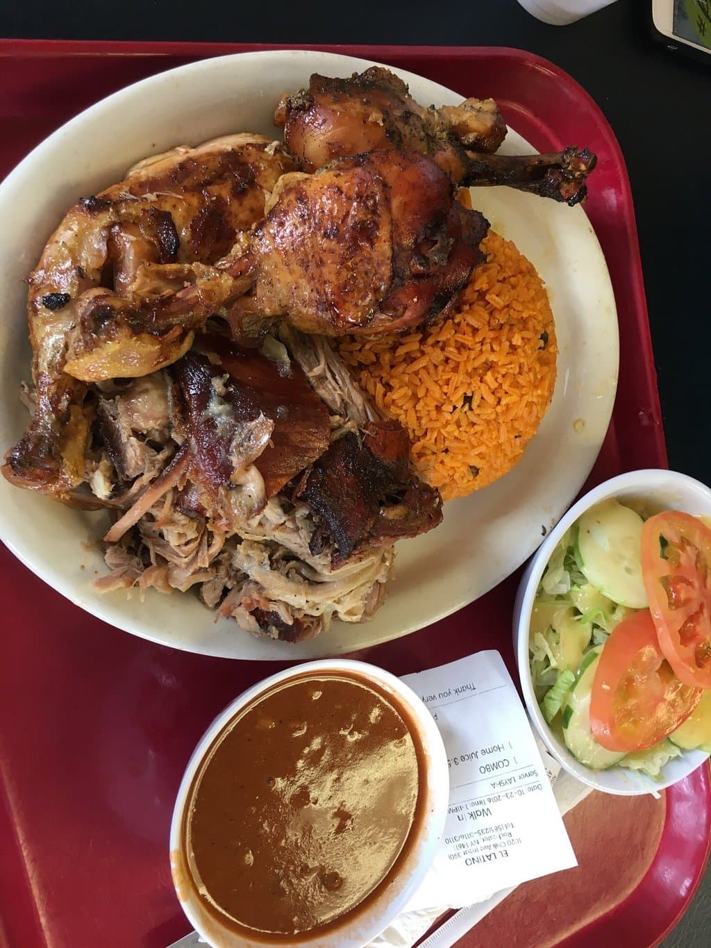This is a 2 meat combo and more food than we could eat-two adults. Pernil and baked chicken. The