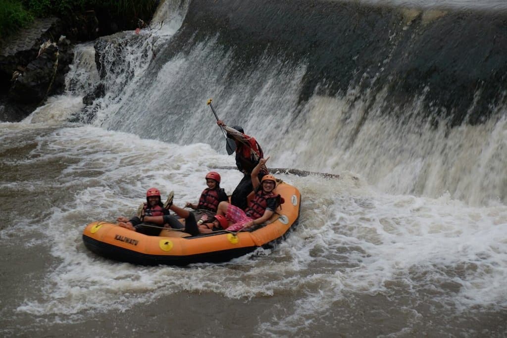 Family river rafting for fun and enjoy