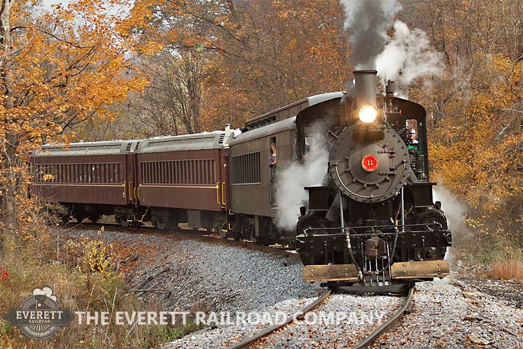 Number 11, our restored Alco 2-6-0 Mogul, steams southbound with an excursion train in Fall 2015
