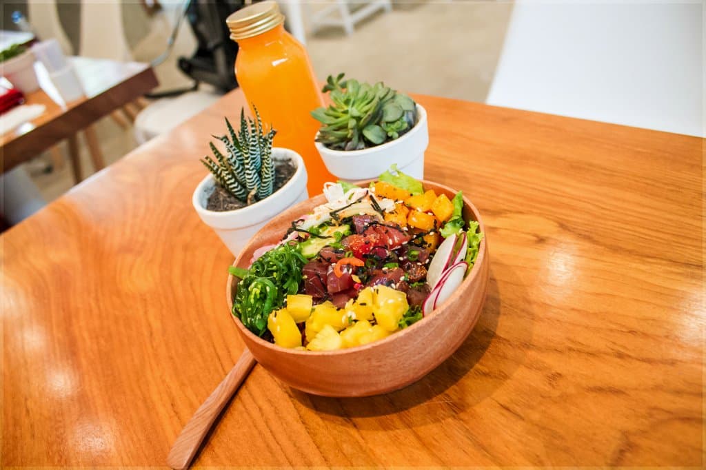 Ahi Tuna Poke and fresh cold pressed orange juice. Healthy and delicious