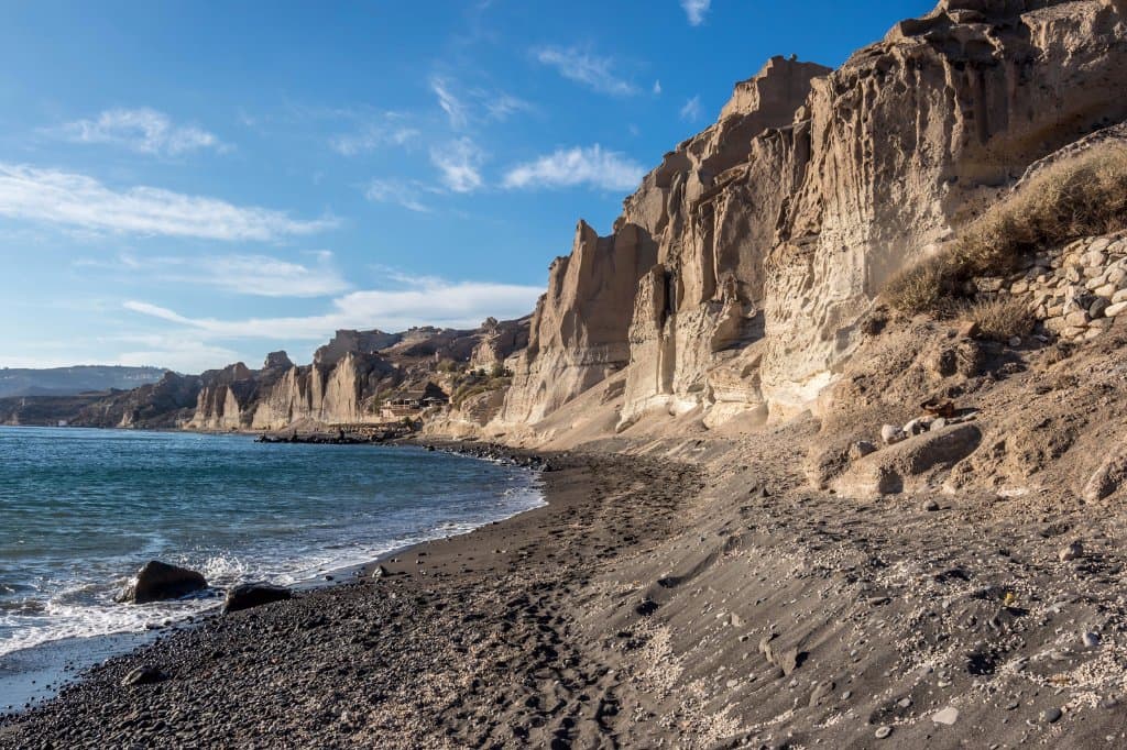 Volcanic beach with pumice cliffs